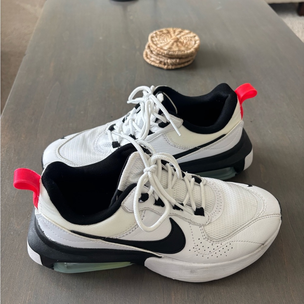 White and Black Sneakers with Red Accents
